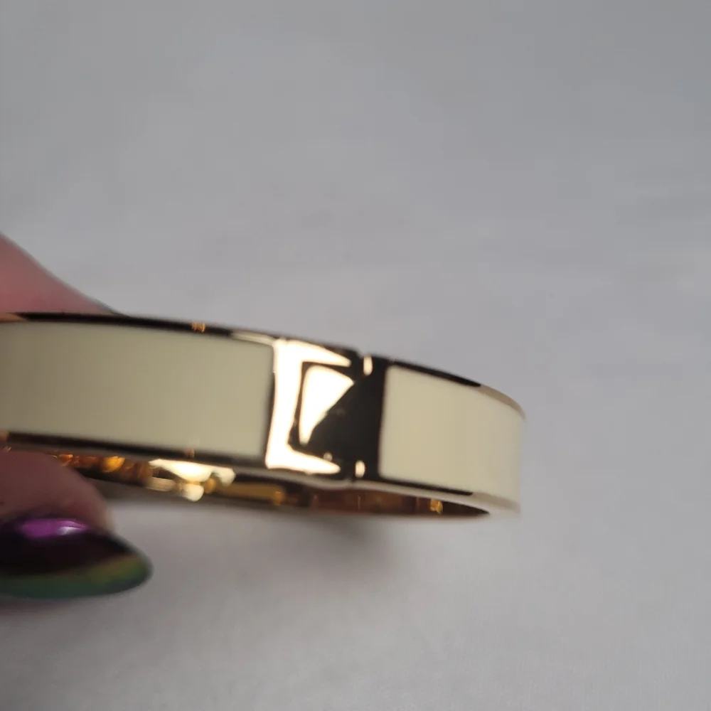 Kate Spade New York Spot The Spade Gold Tone Cream Enamel Hinged Bracelet - Picture 3 of 7